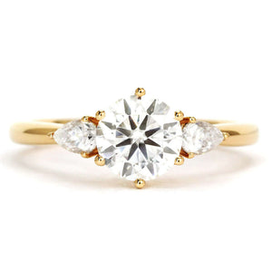 Charlize Round Moissanite with Pear Side Stones Trilogy Ring in 18K gold - LeCaine Gems