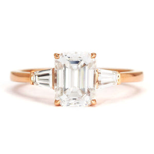 Eva Emerald Step Cut Moissanite with Trapezoid Side Stones Trilogy Ring in 18K gold - LeCaine Gems