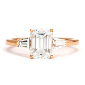 Eva Emerald Step Cut Moissanite with Trapezoid Side Stones Trilogy Ring in 18K gold - LeCaine Gems