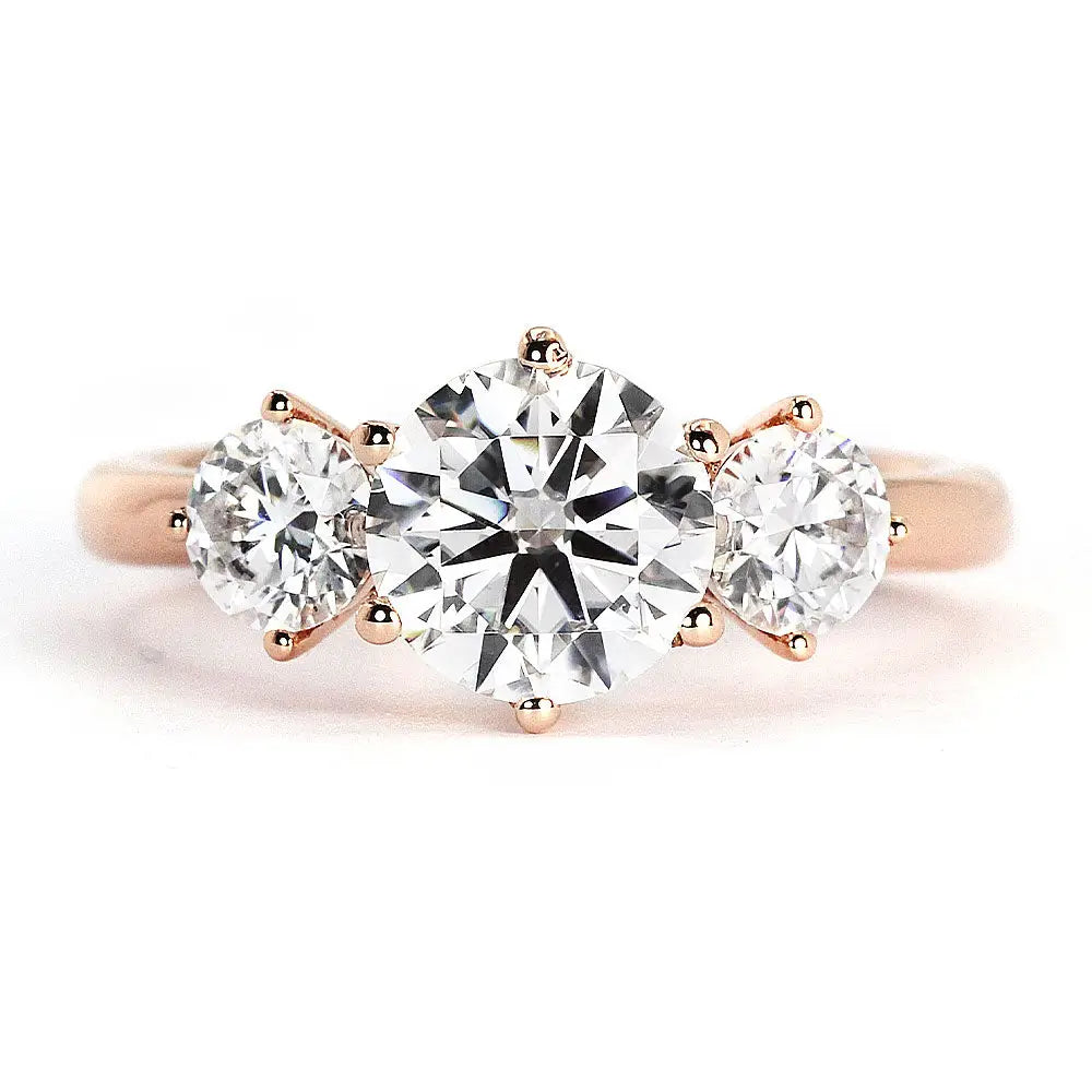 Patricia Round Moissanite with Side Stones Trilogy Ring in 18K Gold - LeCaine Gems