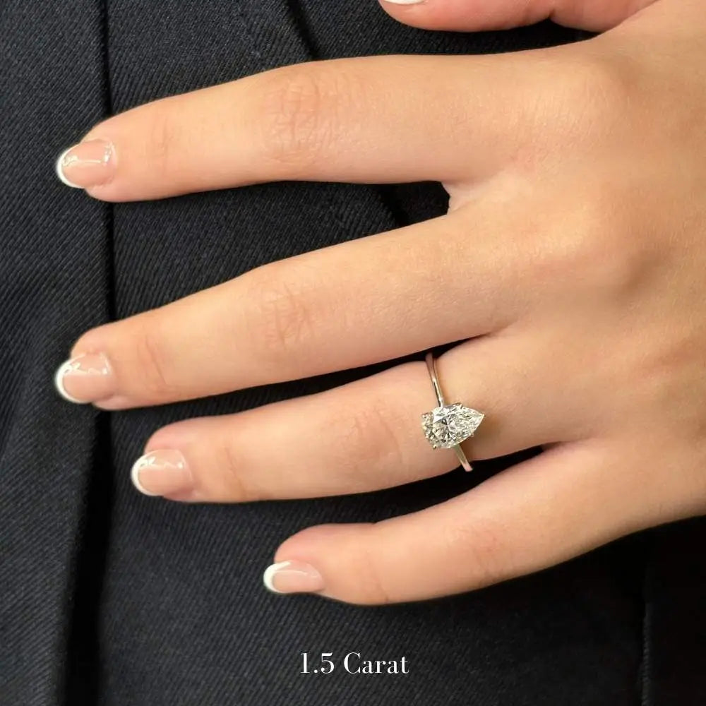 Rhea Pear Moissanite in Petal Setting Solitaire Ring - LeCaine Gems