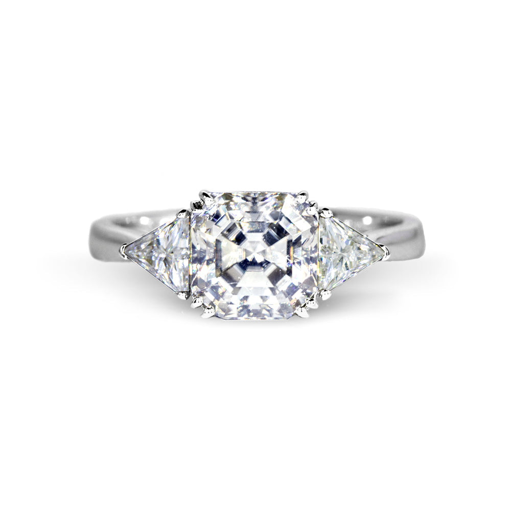 Vitra Asscher Moissanite with Trilliant Side Stones Trilogy Ring in 18K gold - LeCaine Gems